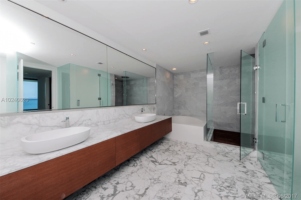Oceana Bal Harbour Magnificent spa-like bathrooms featuring a fashionable European wet bathroom layout