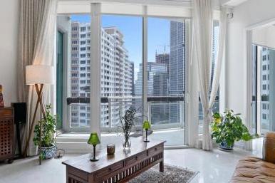Best Miami Waterfront Condos for Sale - Asia Brickell Key offers a number of upscale amenities for its residents, including a high-tech fitness center, a full-service concierge, a swimming pool, a hot tub, a tennis court, and 24-hour valet parking service.